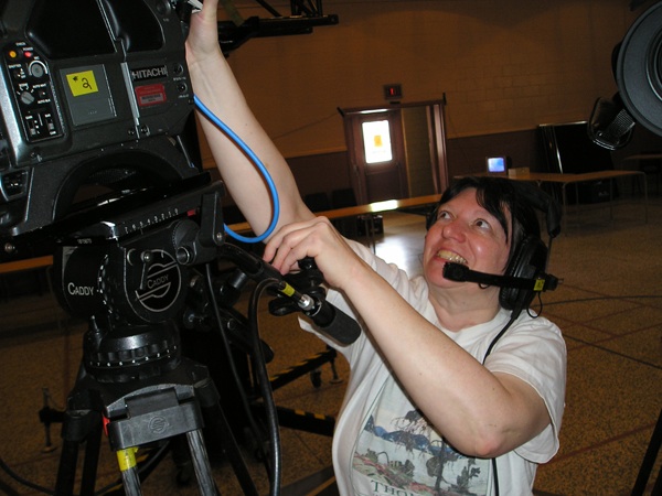 Cathi Stretching at a video camera