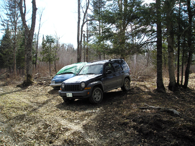 Van and Jeep at property in Quebec