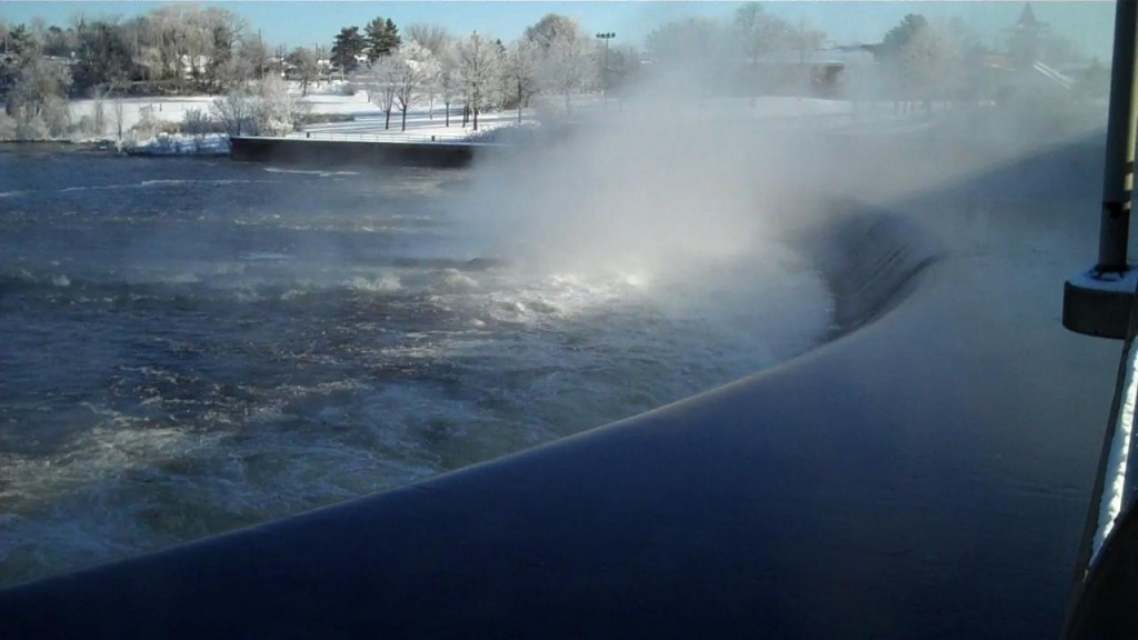 Rounded man made dam spewing fog on Boxing Day, 2009